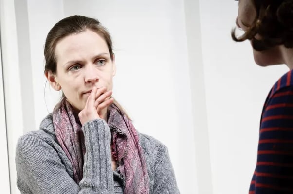 Concerned woman talking to friend