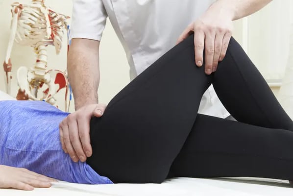 Claimant having knee examined at personal injury medical