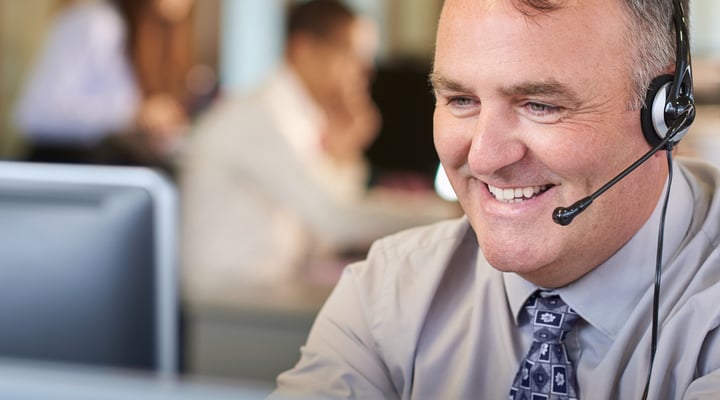 Personal injury solicitor discussing a claim with a client on the phone