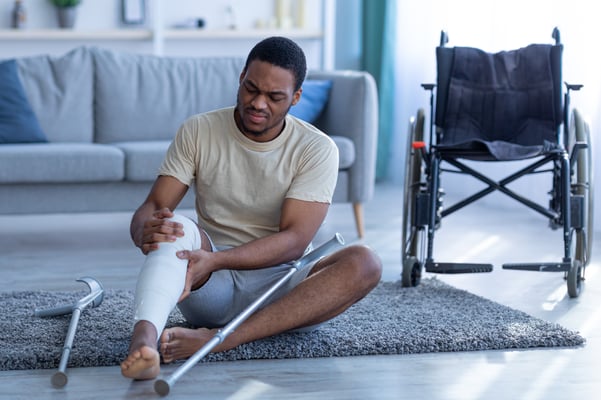 Man at home off work with broken leg