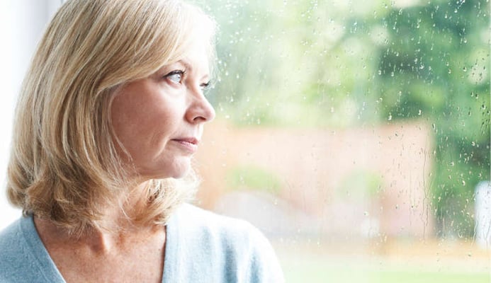 Woman looking concerned after being injured