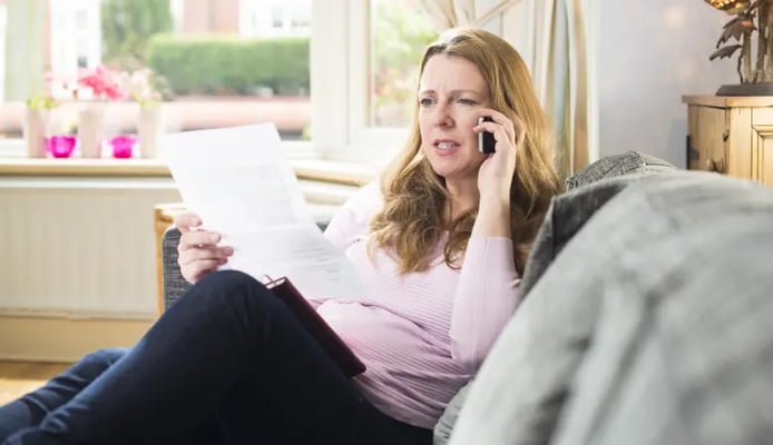 Injured woman discussing injury claim with her solicitor