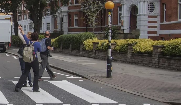 Pedestrians on zebra crossing not looking where they are going
