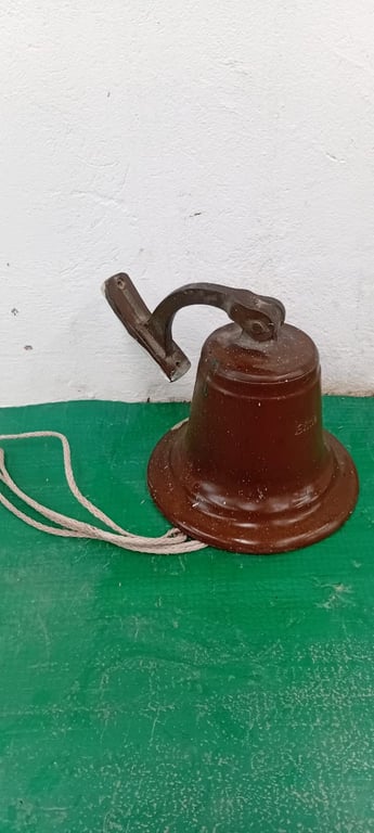Wall-mounted brass bell