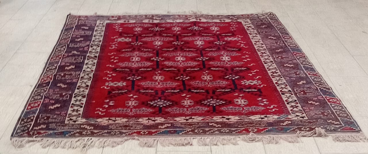 Traditional handwoven-style patterned rug