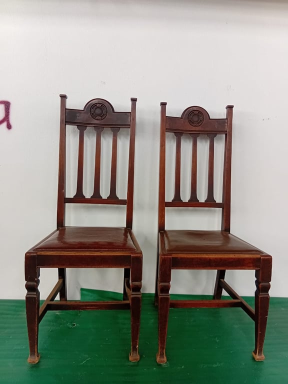 A Pair Of Victorian Mahogany Hall Chairs