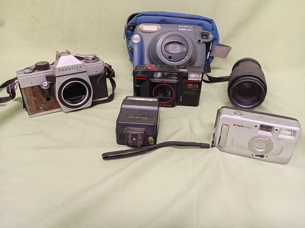 Assorted Vintage Film Cameras and Accessories Collection