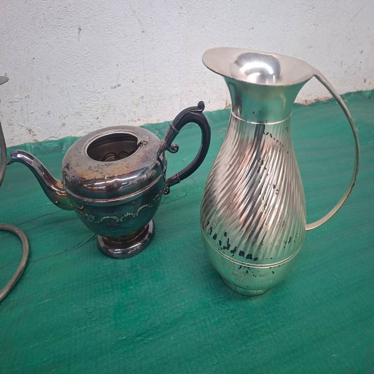Collection Of Silver Colored Items