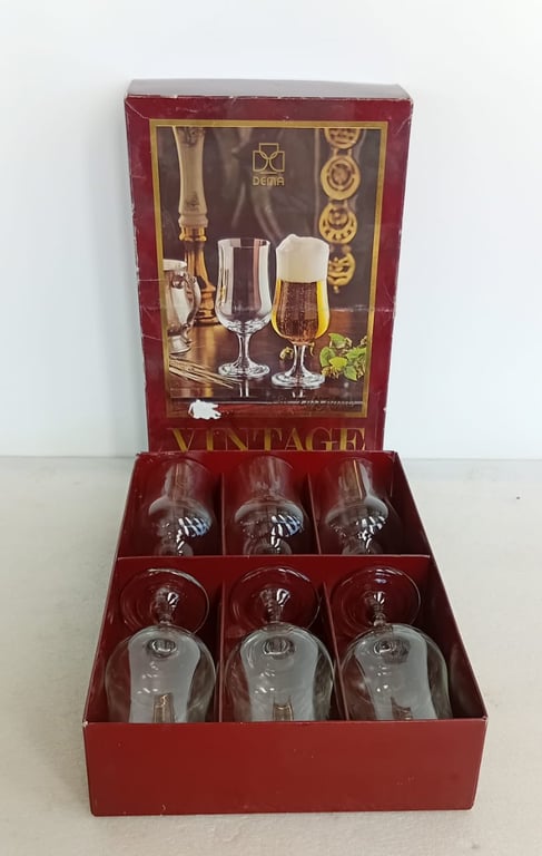 A  set of Dema & Pints Glasses.