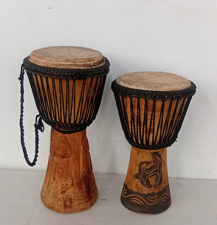 A Pair Of Hand-Carved African Drums