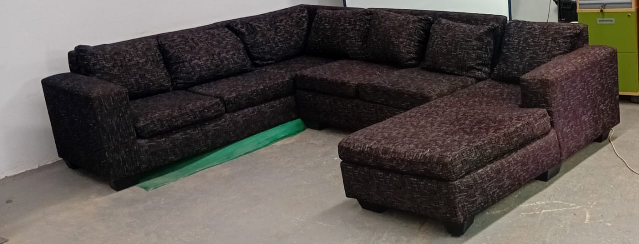 A Set Of Charcoal Grey Couch