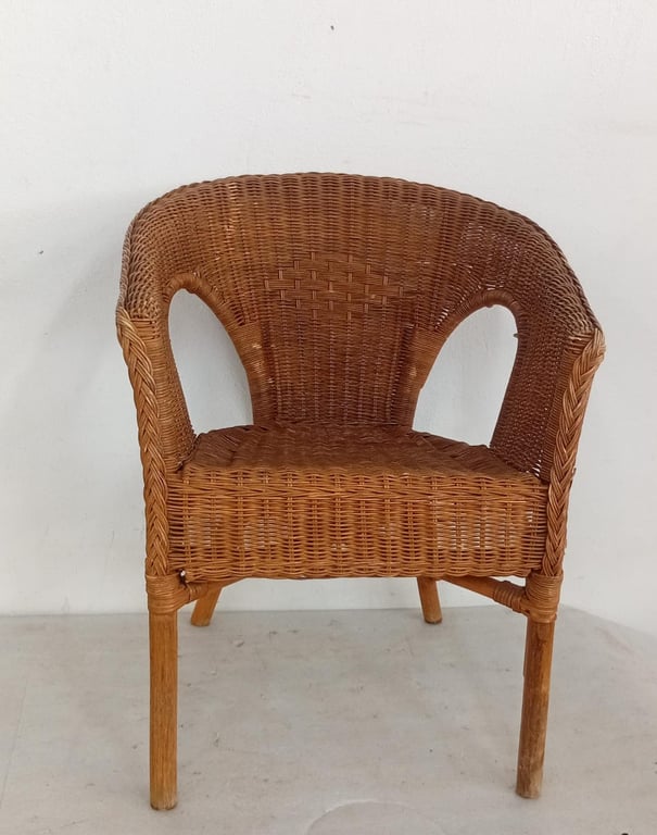 Elegant woven wicker/rattan armchair