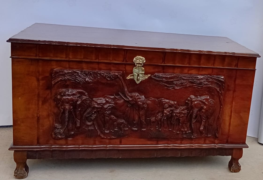 Hand-carved wooden elephant trunk chest