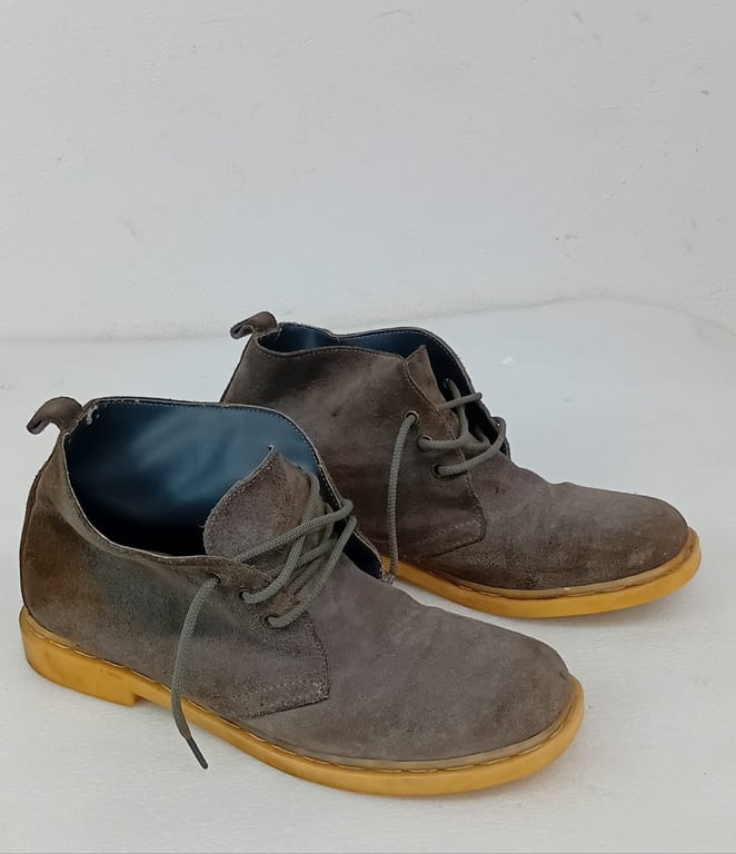 A Pair Of Brown Suede Safari Boots