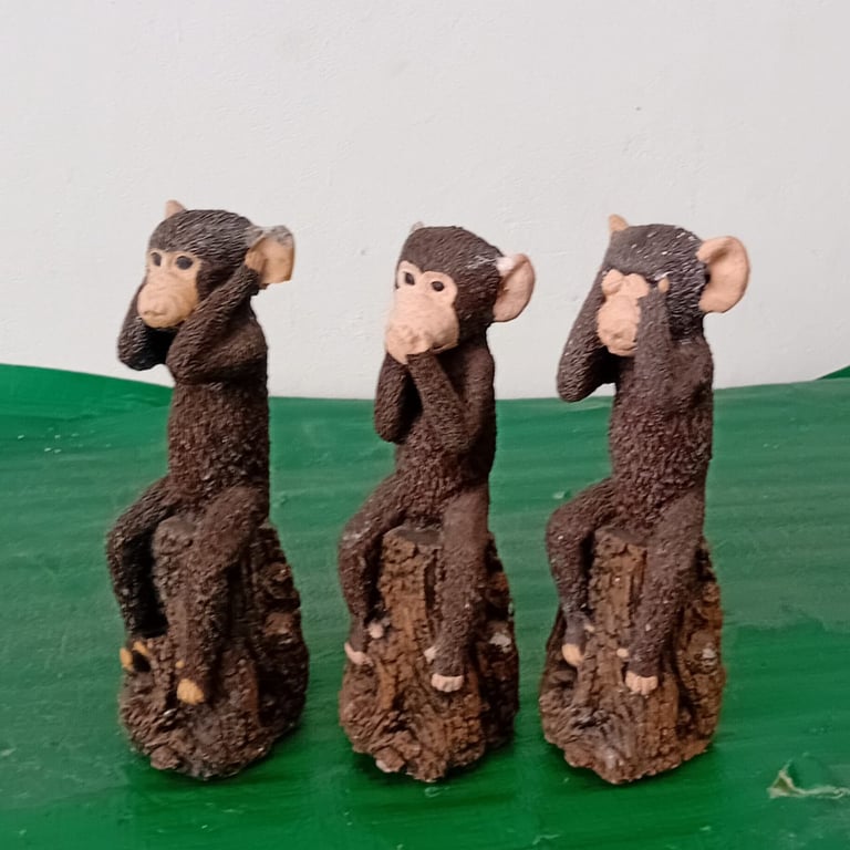 A Set Of 3 Monkeys Figurines