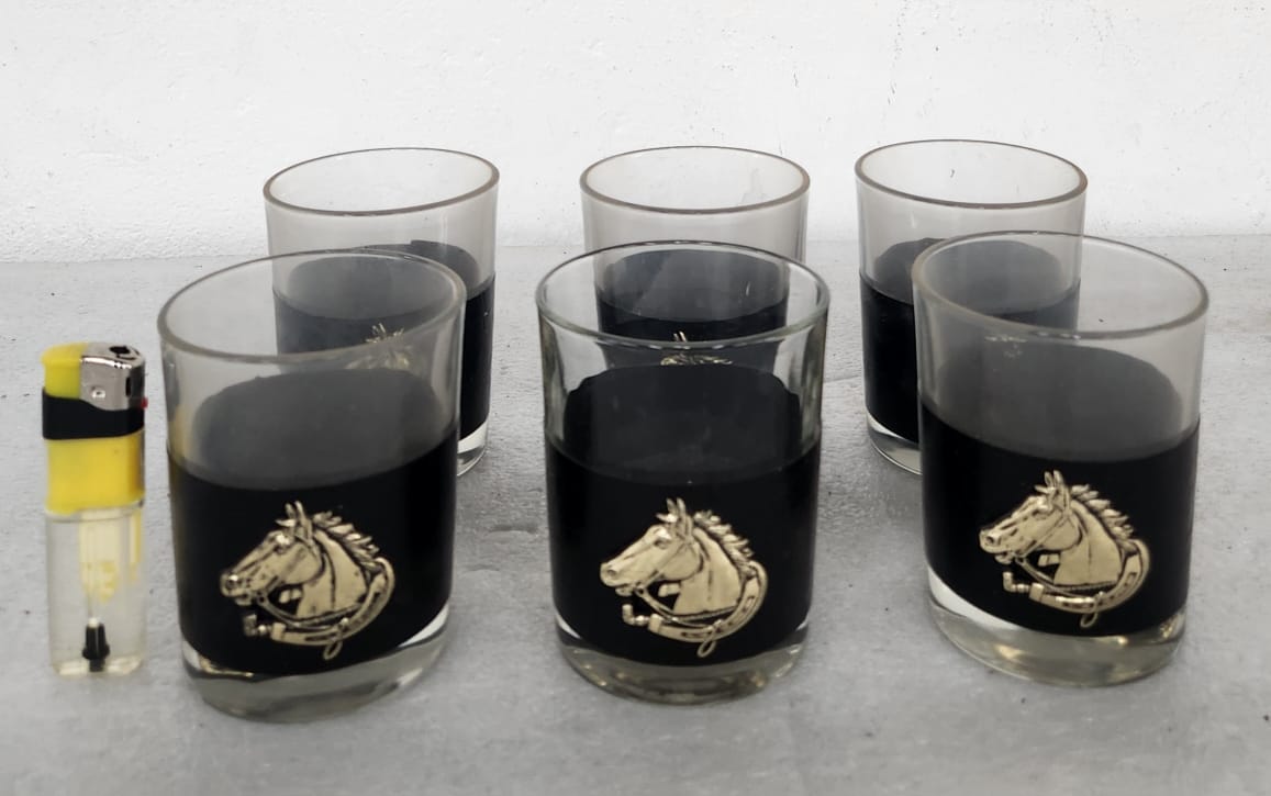 A set of six vintage horse-themed whiskey glasses