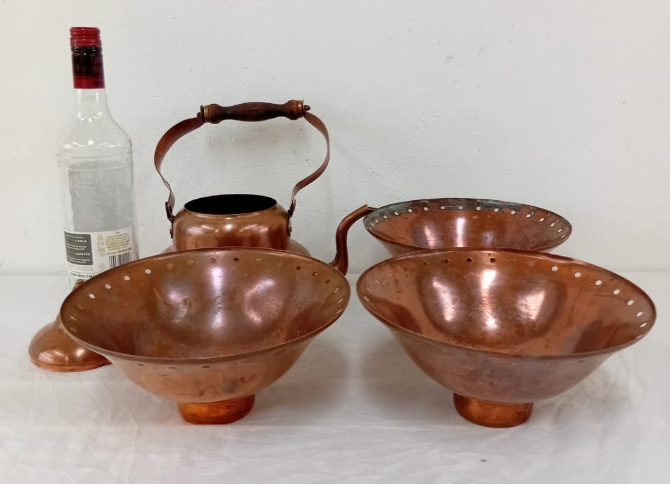 Vintage lampshades and copper kettle