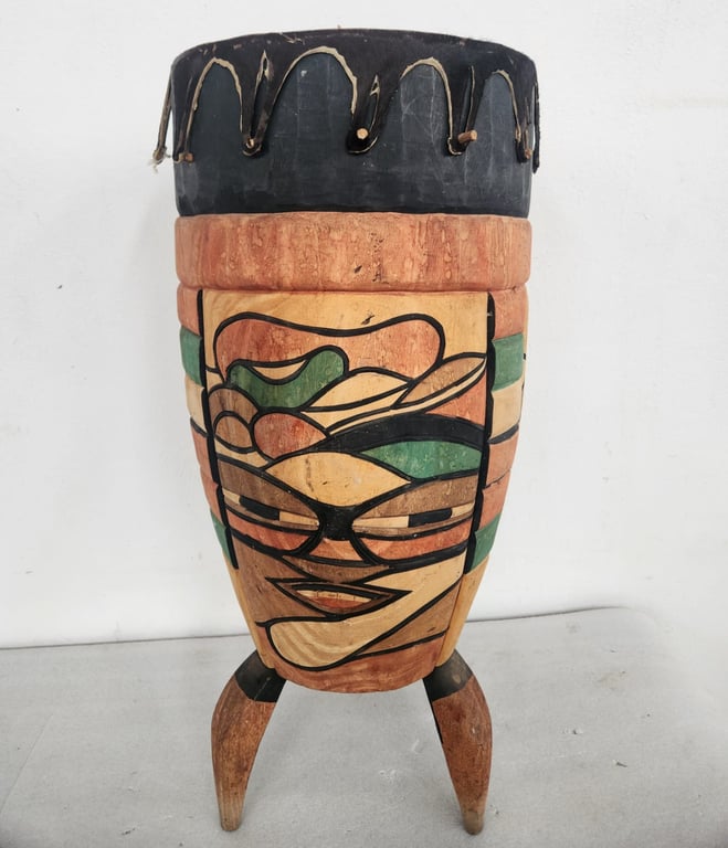 Hand-Carved Wooden Drum with Stylised Face Motif