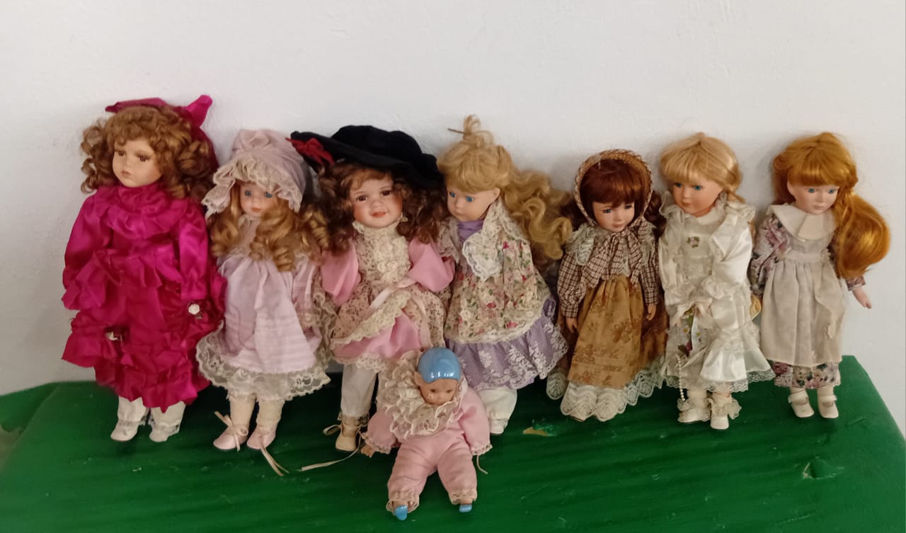 Collection Of Porcelain Dolls