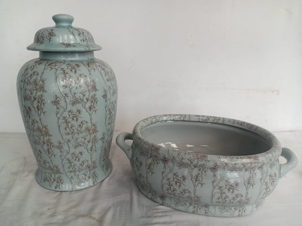 Pair of Decorative Ceramic Vessels with Floral Motif