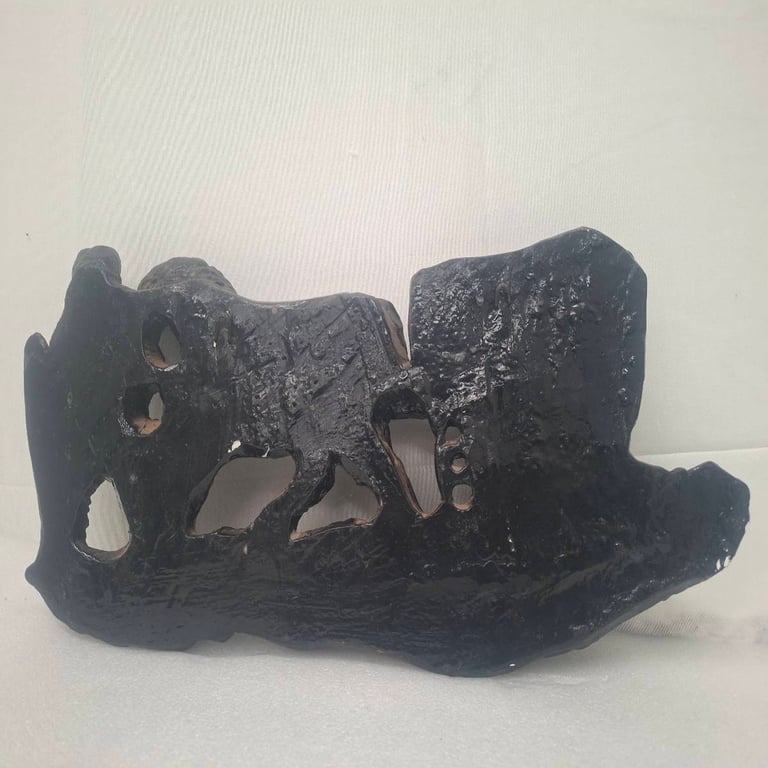 Rustic Hand-Carved Wooden Sculpture