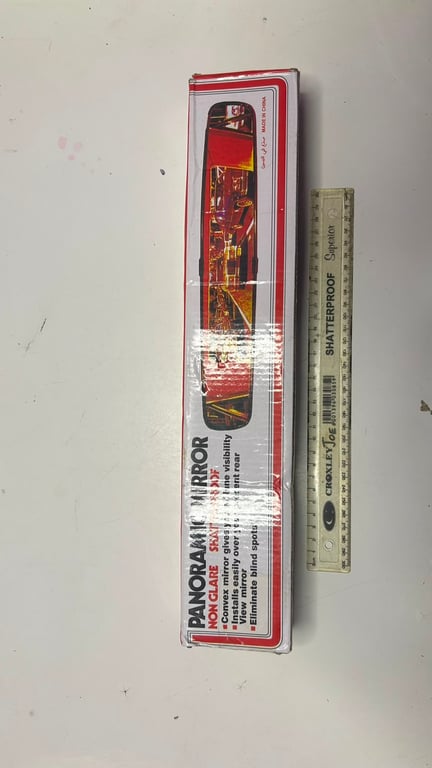 Generic brand panoramic interior car rearview mirror designed for wide angle visibility. It features a non glare shatterproof convex glass surface to eliminate blind spots