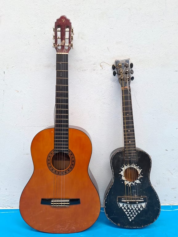 Guitars – One Large & One Small