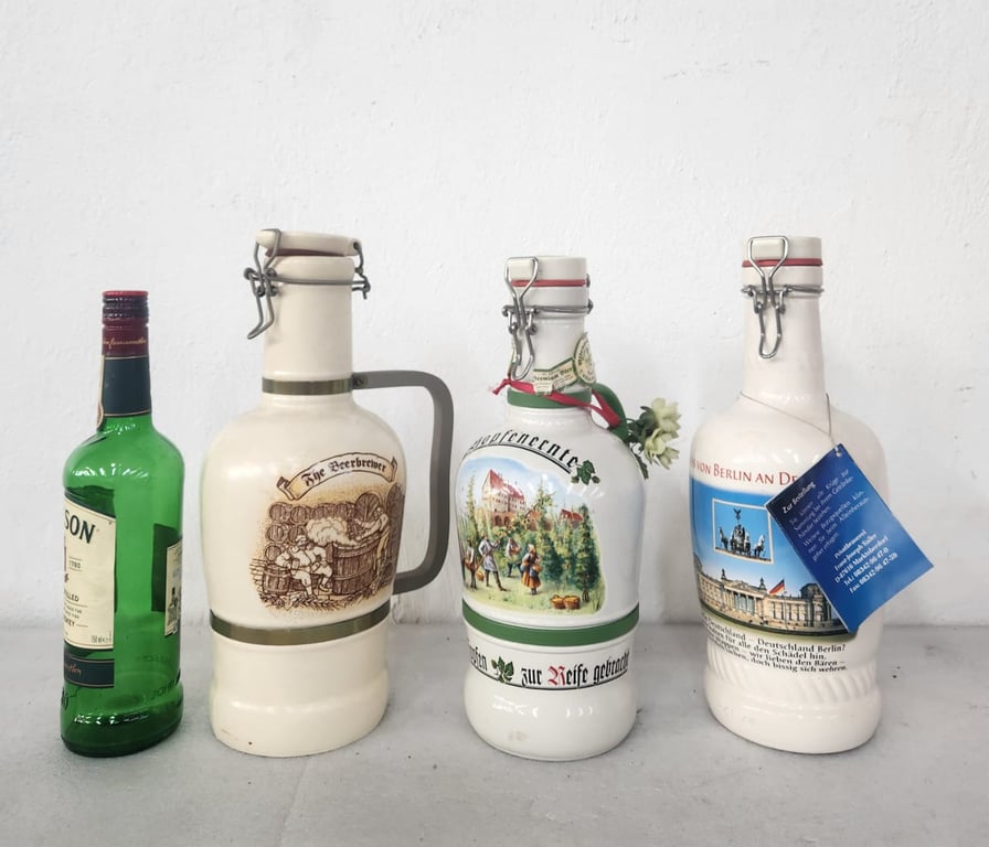 Collection of vintage German ceramic beer growlers (Krugs/decanters)