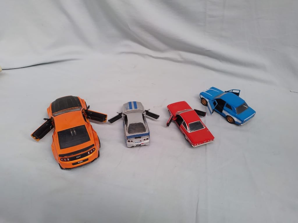 Collection of Diecast Model Cars x 4