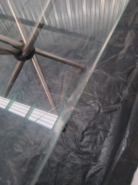Glass table with steel legs