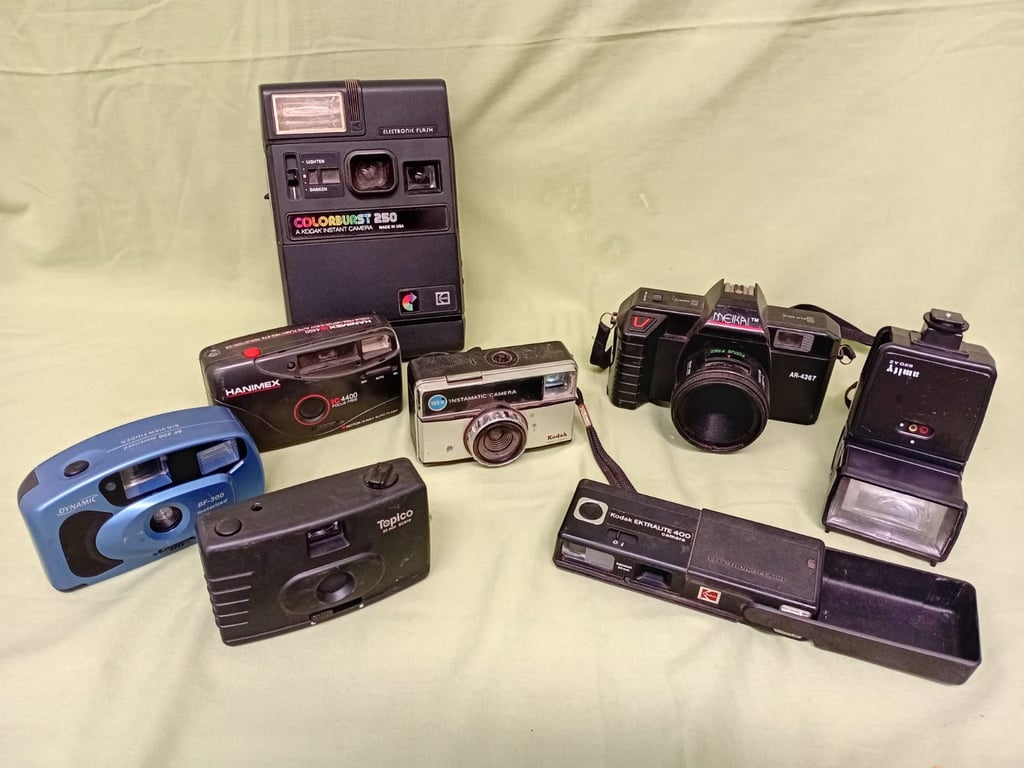 Assorted Vintage Cameras and Electronic Flash Units Collection