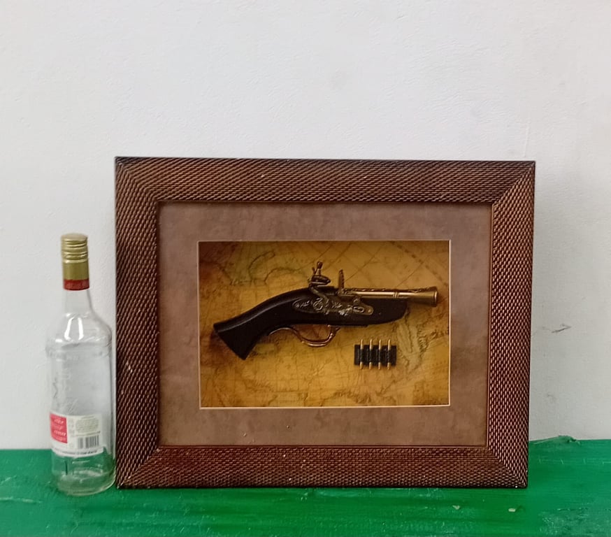 Framed vintage dueling pistol