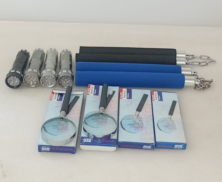Bundle of Mixed Utility Items – Flashlights, Nunchucks & Magnifying Glasses