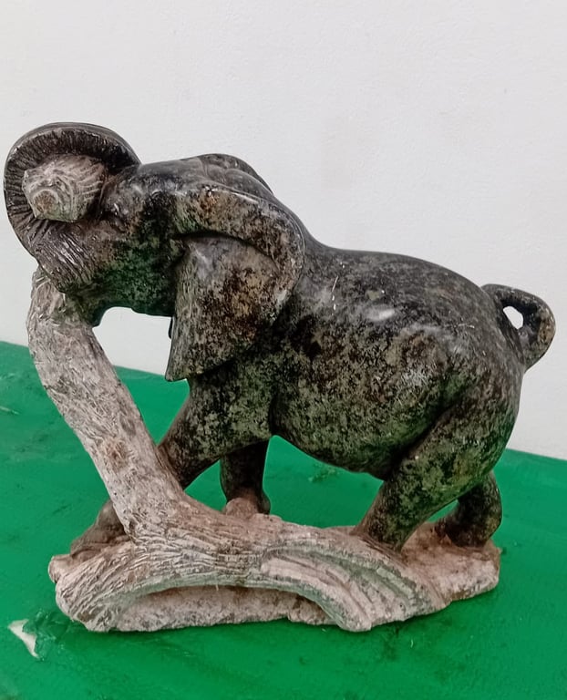 Hand-carved stone elephant sculpture