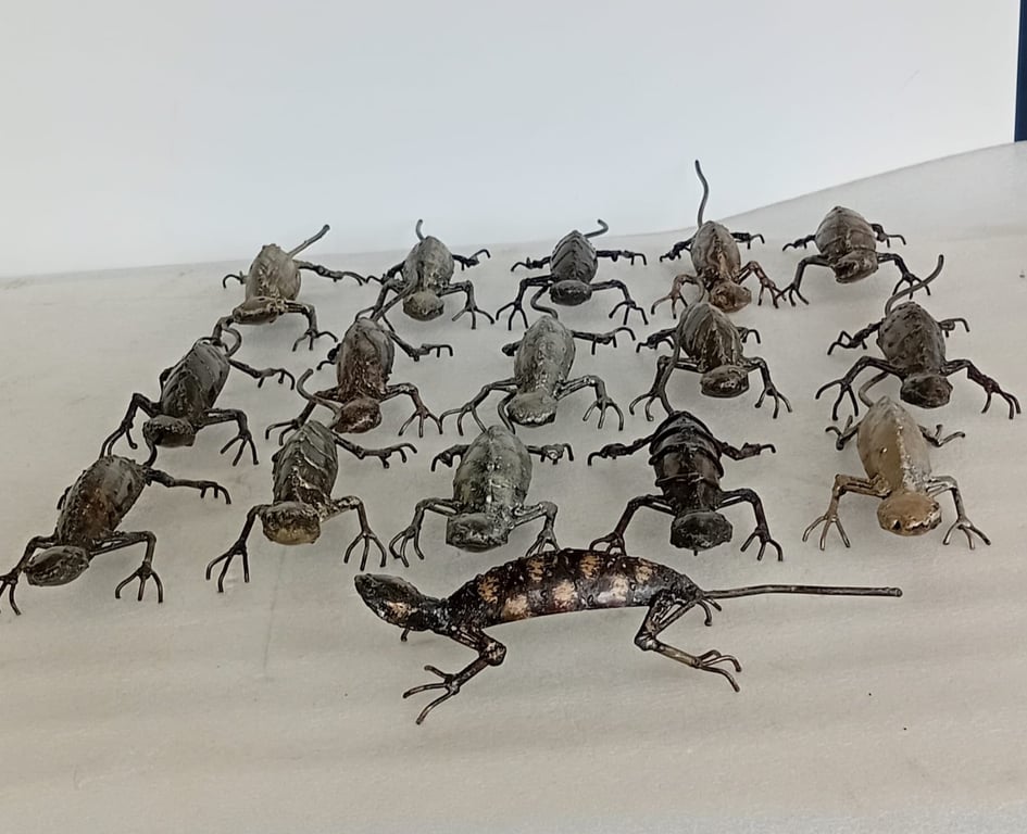 Collection of 17 Hand-Forged Metal Lizard Sculptures
