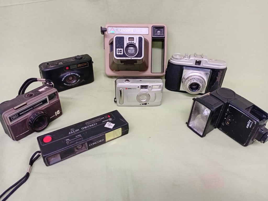 Collection of Vintage Cameras and Camcorder with Accessories