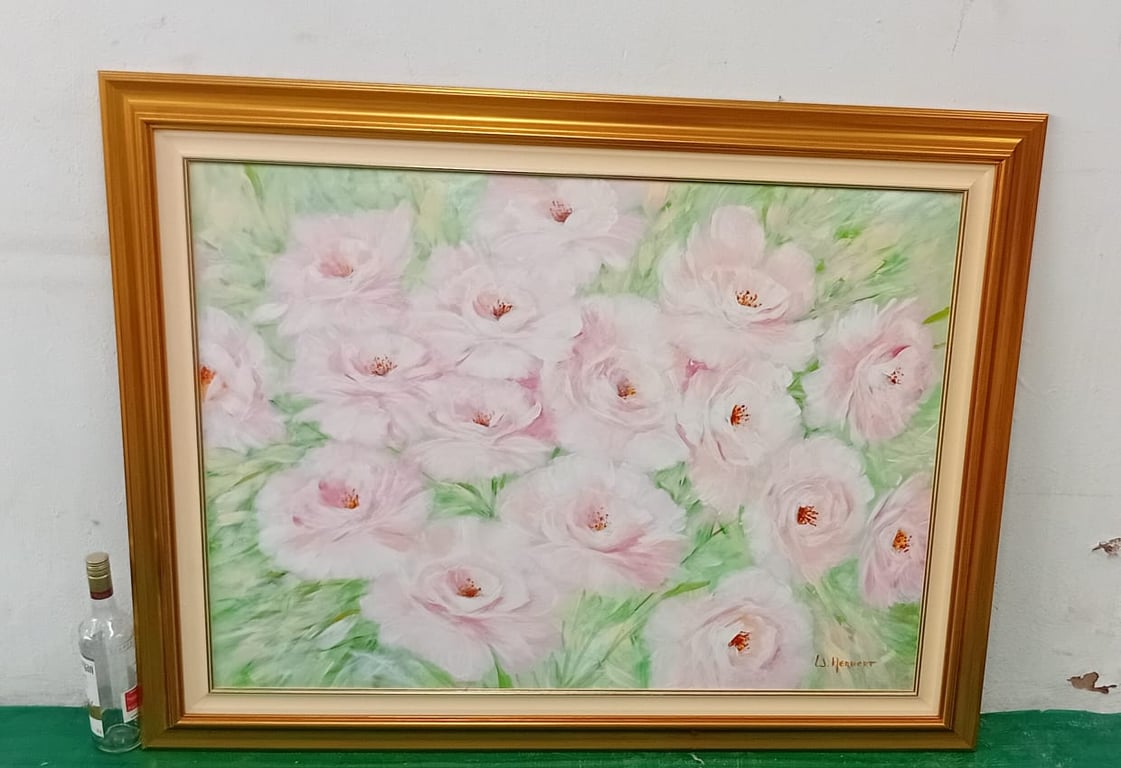 Framed oil painting of pink roses