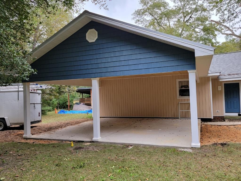 carport finished and new siding painted blue