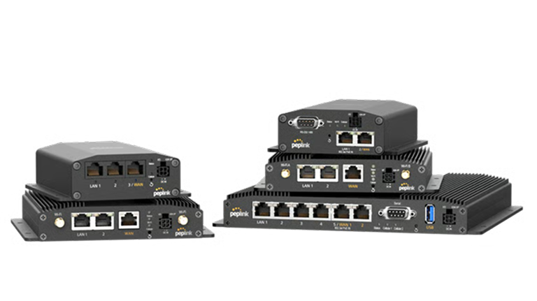 A collection of black Peplink mobile routers stacked together, showing various ethernet, serial, and power ports designed for vehicle and mobile connectivity.