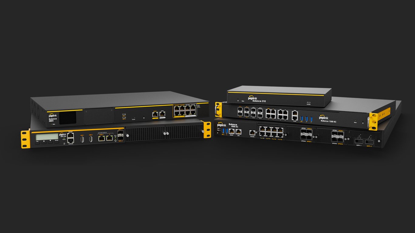 Two Peplink rack-mount enterprise routers with front port panels.