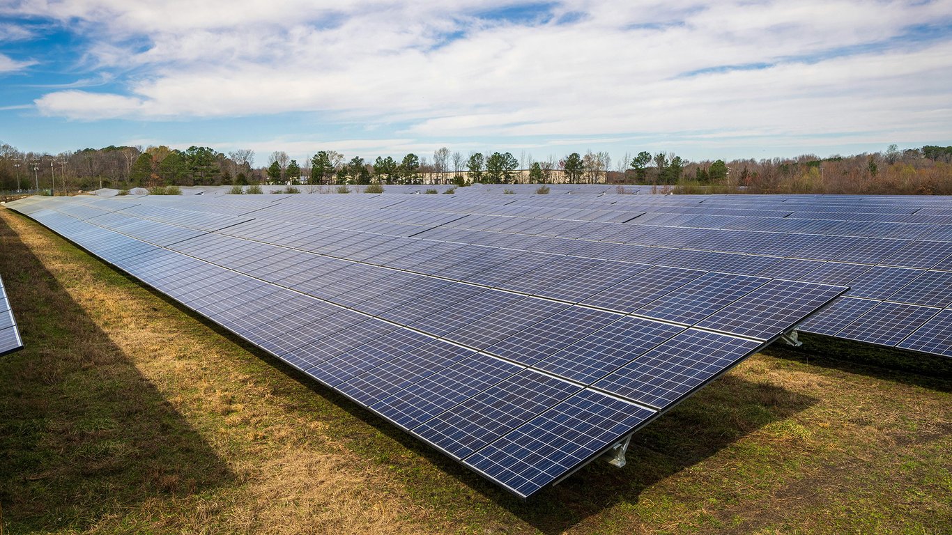 Large solar panel field representing Peplink utilities and energy connectivity solutions.