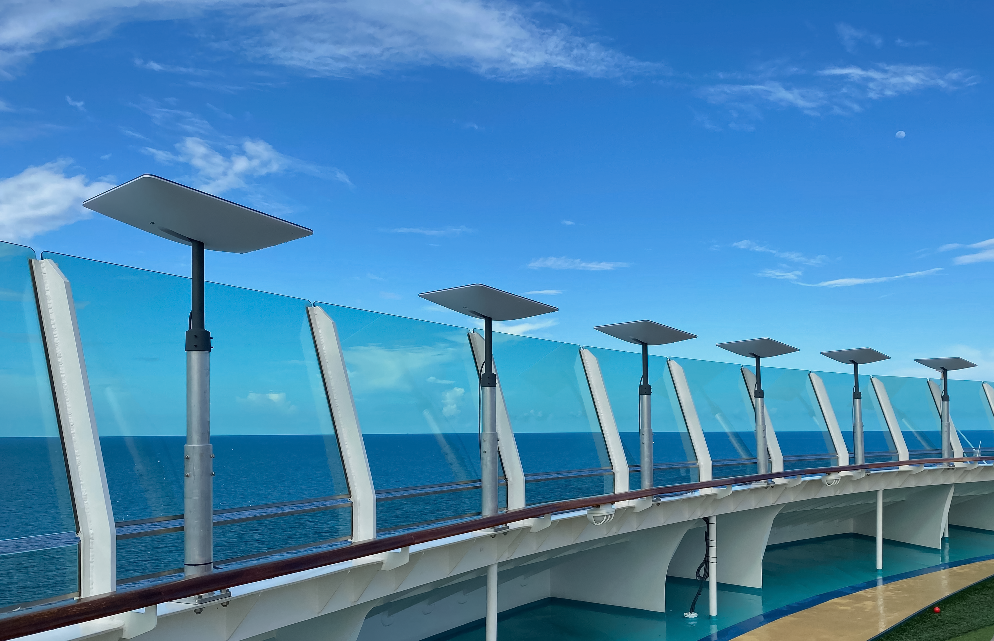 Multiple Starlinks on a cruise ship deck, used as the background for Peplink's Authorized Peplink & Starlink Solution Provider partner program section.