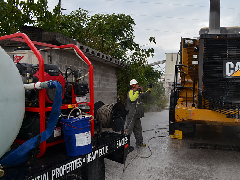 Hotsy Rental Pressure Washer Cleaning Heavy Equipment