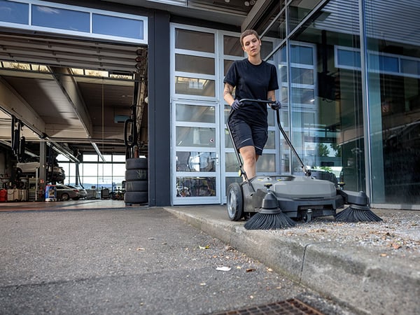 Karcher KM 70/20 Sweeping Debris from Auto Shop