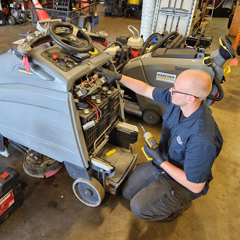 Northstar Service Technician Repairing Karcher Floor Scrubbers