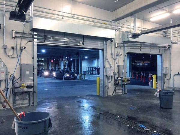 Ceiling Booms Installed in Dual Wash Bay