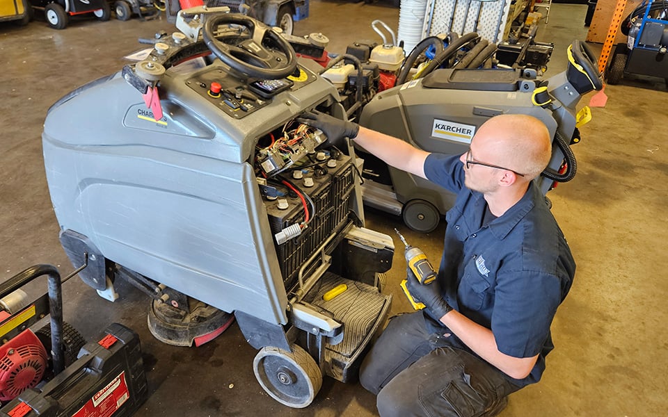 Northstar Service Technician Repairing Karcher Floor Scrubbers