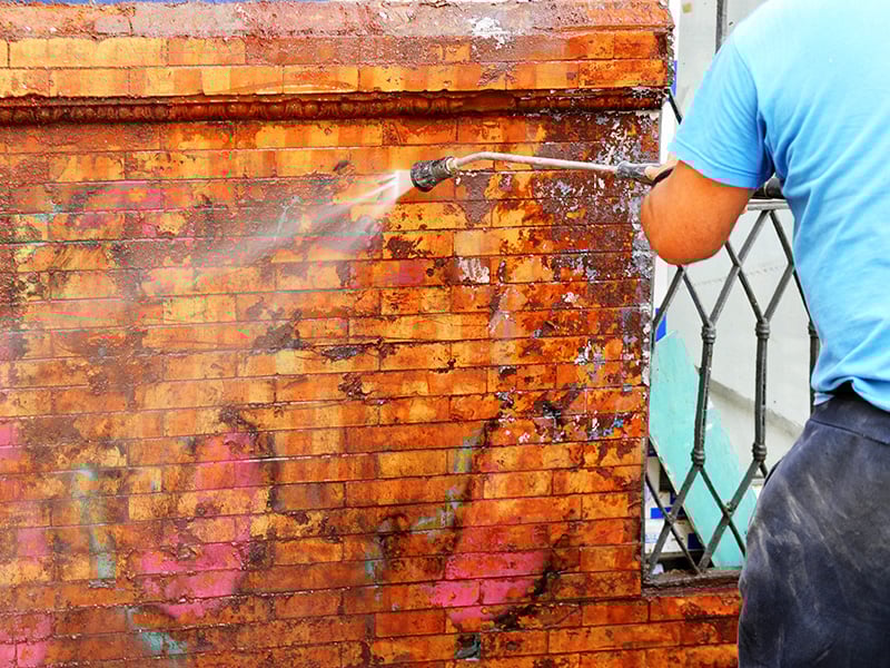 Removing Graffiti with a Pressure Washer
