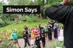 group of young kids playing simon says