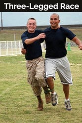two young men playing Three-Legged Race